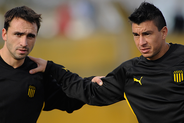 Emiliano Albin en su regreso y "Japo" Rodríguez en el primer día en Peñarol.