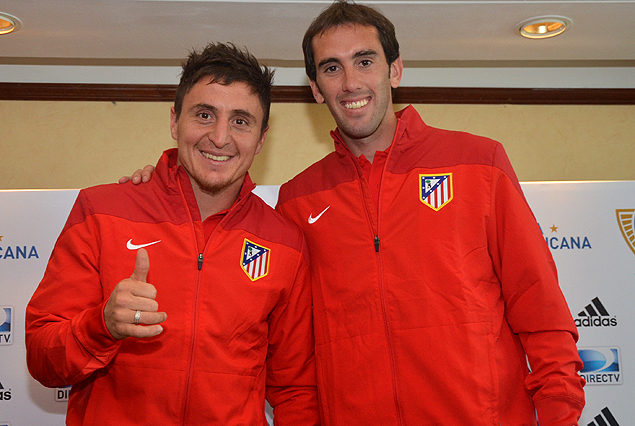 Cristian "Cebolla" Rodríguez y Diego Godin en el Hotel Sheraton, instalados con el Atlético Madrid. 