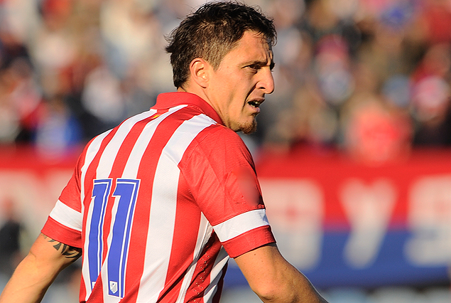 Cristian "Cebolla" Rodríguez con al camiseta de Atlético Madrid.