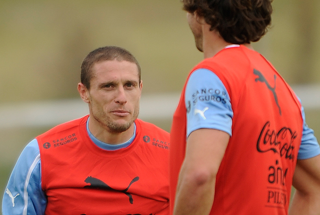 Diego "Ruso" Pérez y Diego Lugano en el complejo.