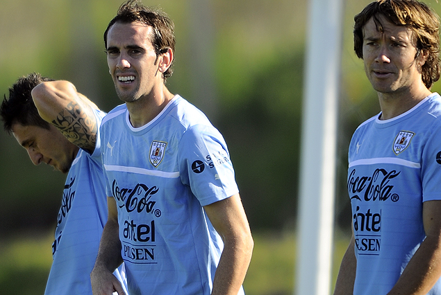Cristian Rodríguez, Diego Godín y Diego Lugano.