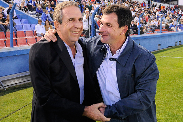 Gerardo Pelusso y Jorge Giordano, abrazo de amigos. 