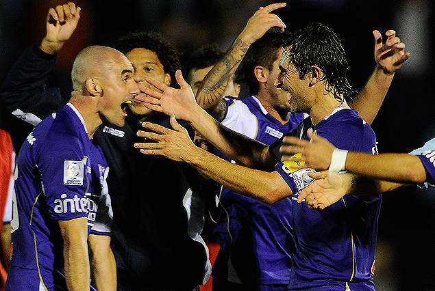 Nicolás Correa y Andrés Fleurquin en el eufórico festejo del final.