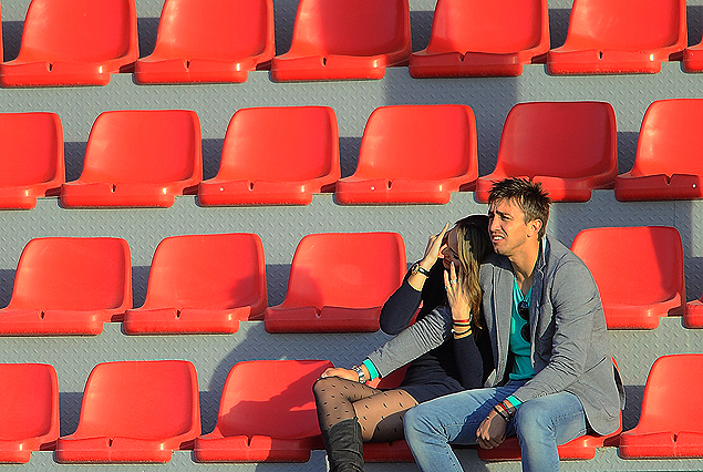 Fernando Muslera junto a su pareja en el estadio de Galatasaray.