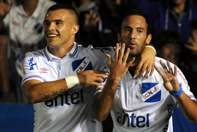 Cristian Tabó y Gonzalo Ramos en el gol del volante, el quinto tricolor.