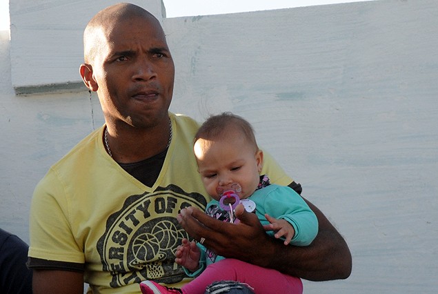Regueiro y una tierna imagen en plena tribuna del Tróccoli. 