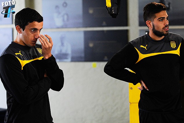 Carlos Luque junto a Nicolás Albarracín en el gimnasio.