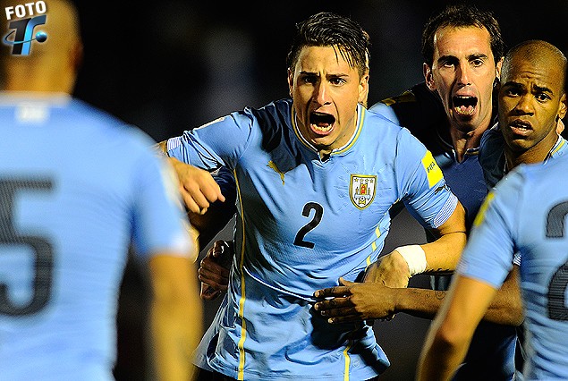 Carlos Sánchez, Josema Giménez, Diego Godín y Diego Rolan con la alegría pintada en sus rostros.